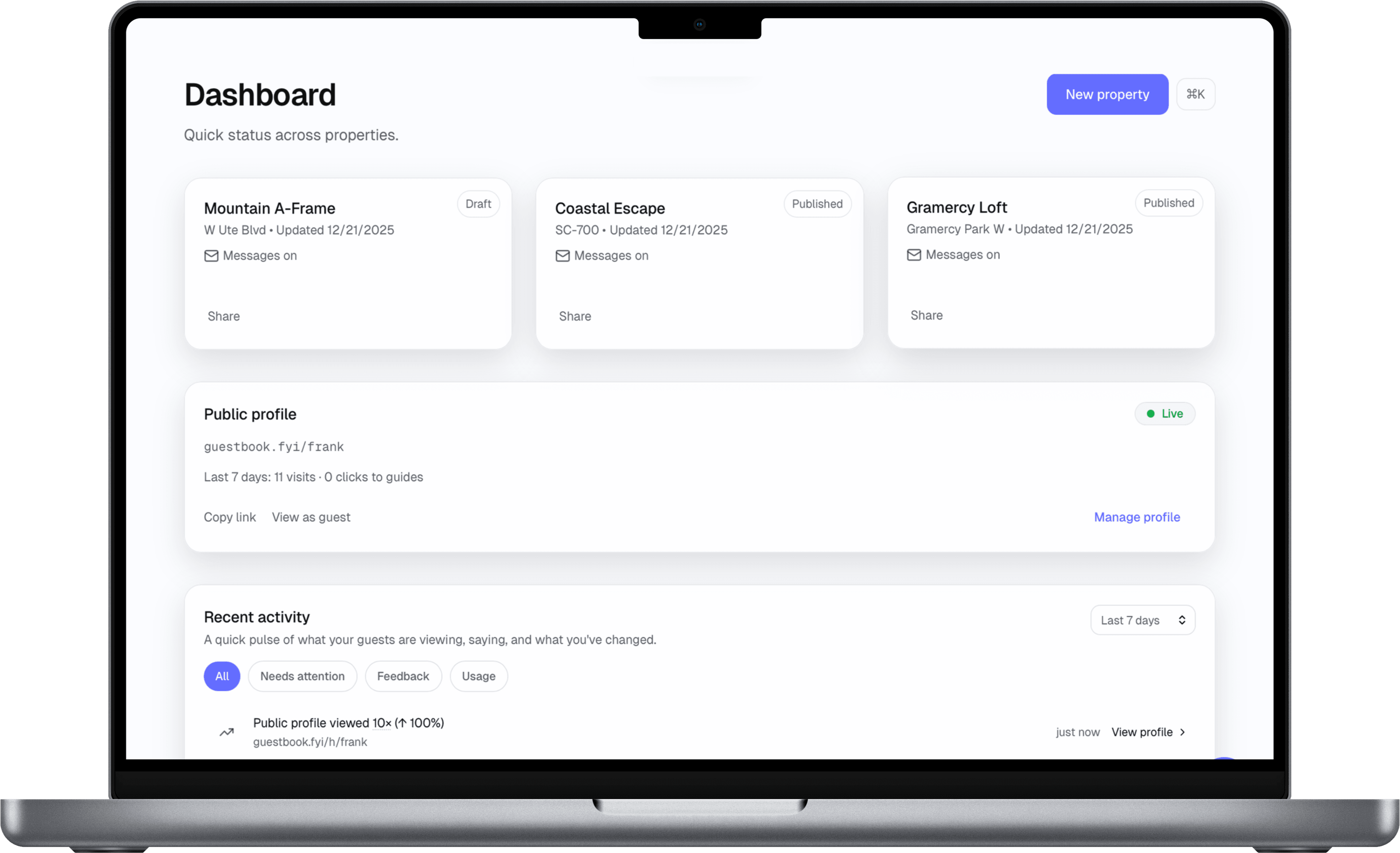 Guestbook dashboard on MacBook showing property management